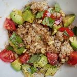 Vegan oatmeal with avocado and tomatoes