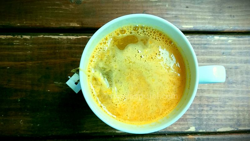 Hot orange juice with pulp and green tea