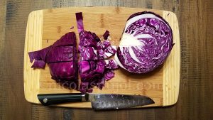 Slice the red cabbage