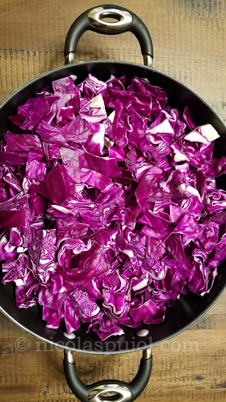 Start cooking the cabbage in a pan.