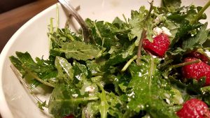 Baby kale salad with lemon and olive oil dressing