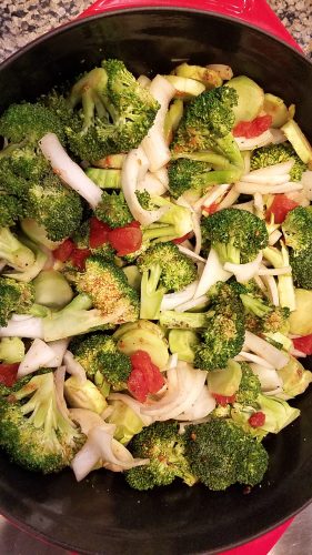 Broccoli in tomato sauce cooking process