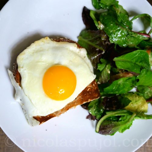 French croque-madame with lettuce salad
