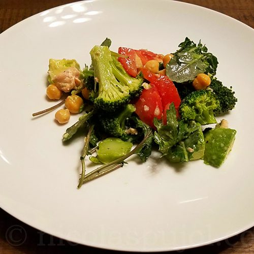 Garbanzo beans avocado tomato salad with lemon dressing