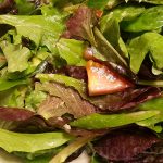 Simple lettuce salad with French lemon dressing