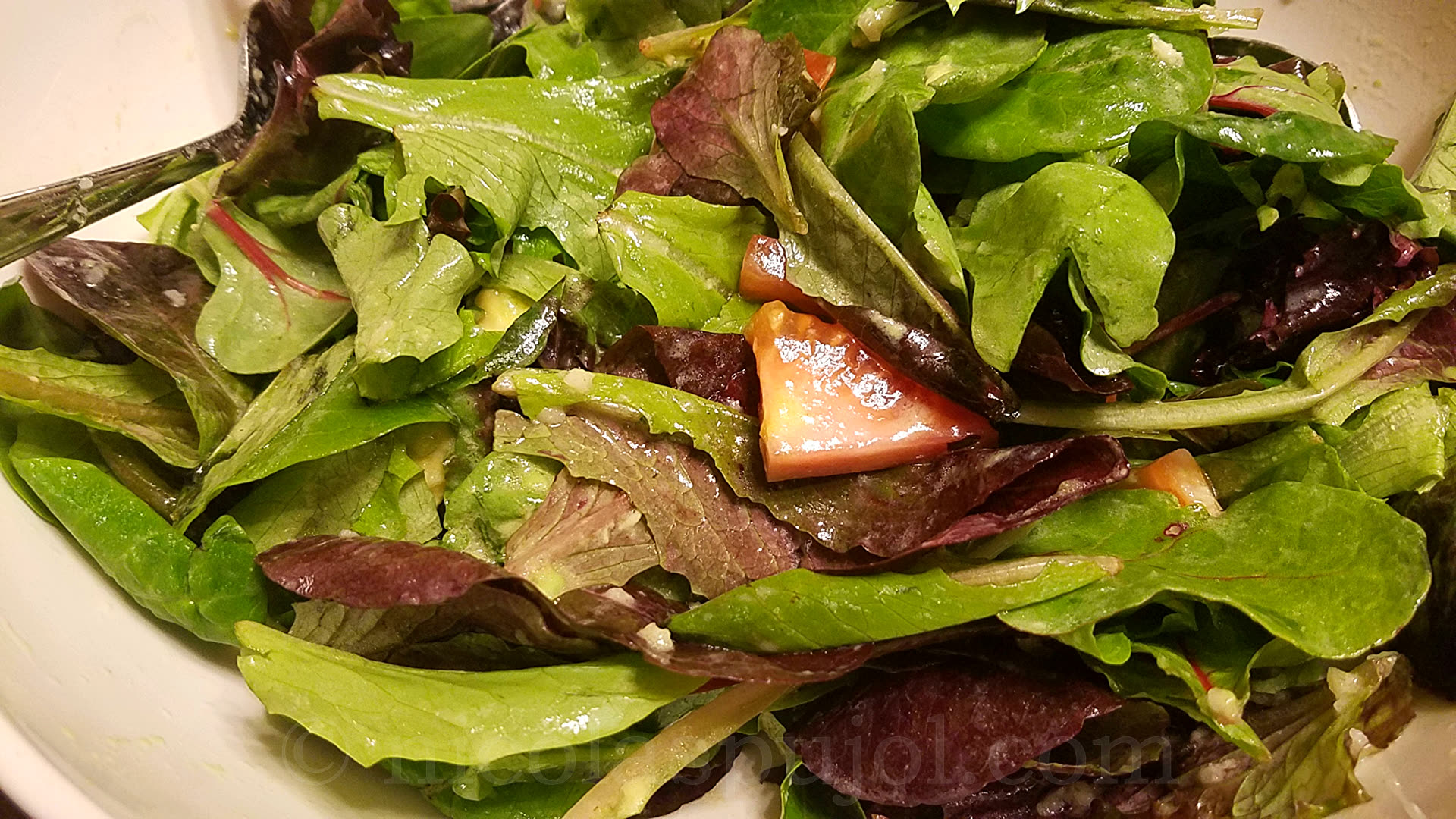 Simple lettuce salad with French lemon dressing