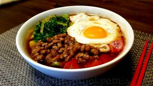 natto noodles with fried egg avocado and seaweed