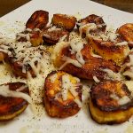 Fried plantains with mozzarella cheese and ground pepper