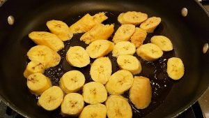 fried ripe plantains in skillet