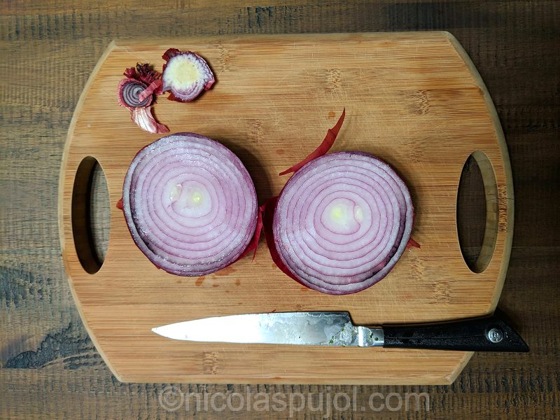 cut the onion edges while leaving the outer skin on