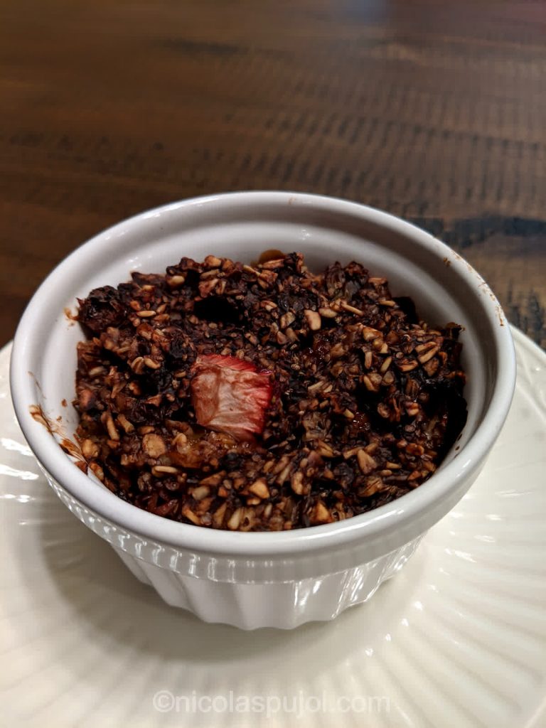 Baked oatmeal with chia seeds fruits and cocoa powder