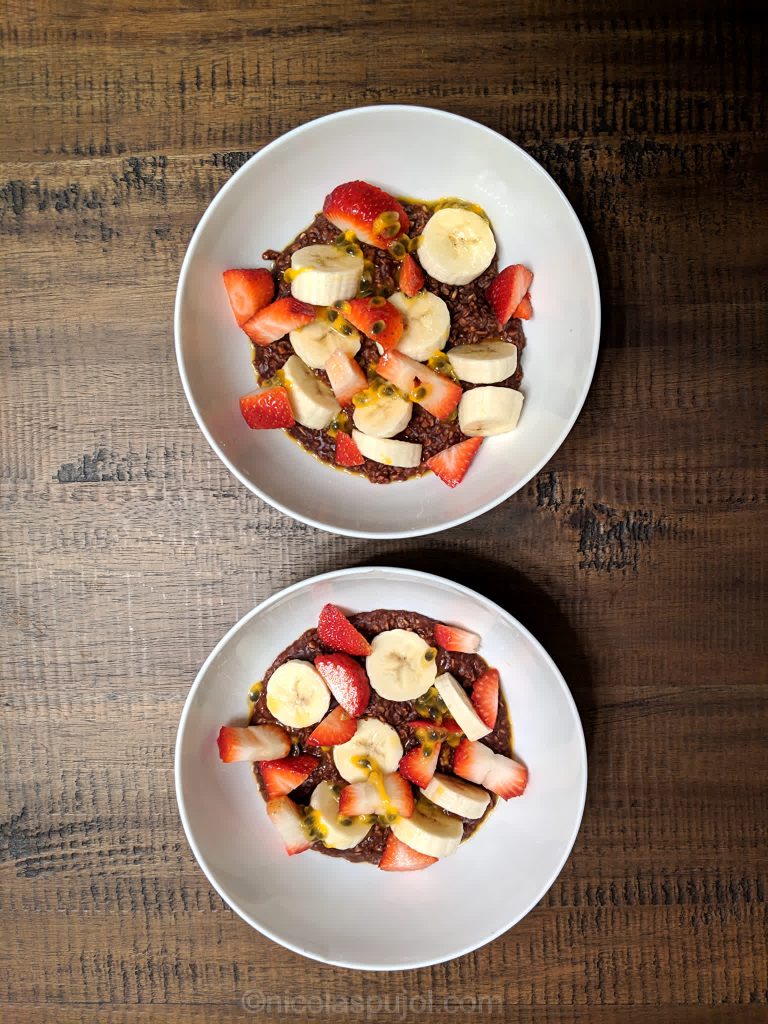 Chocolate oatmeal breakfast with strawberry banana passion fruit