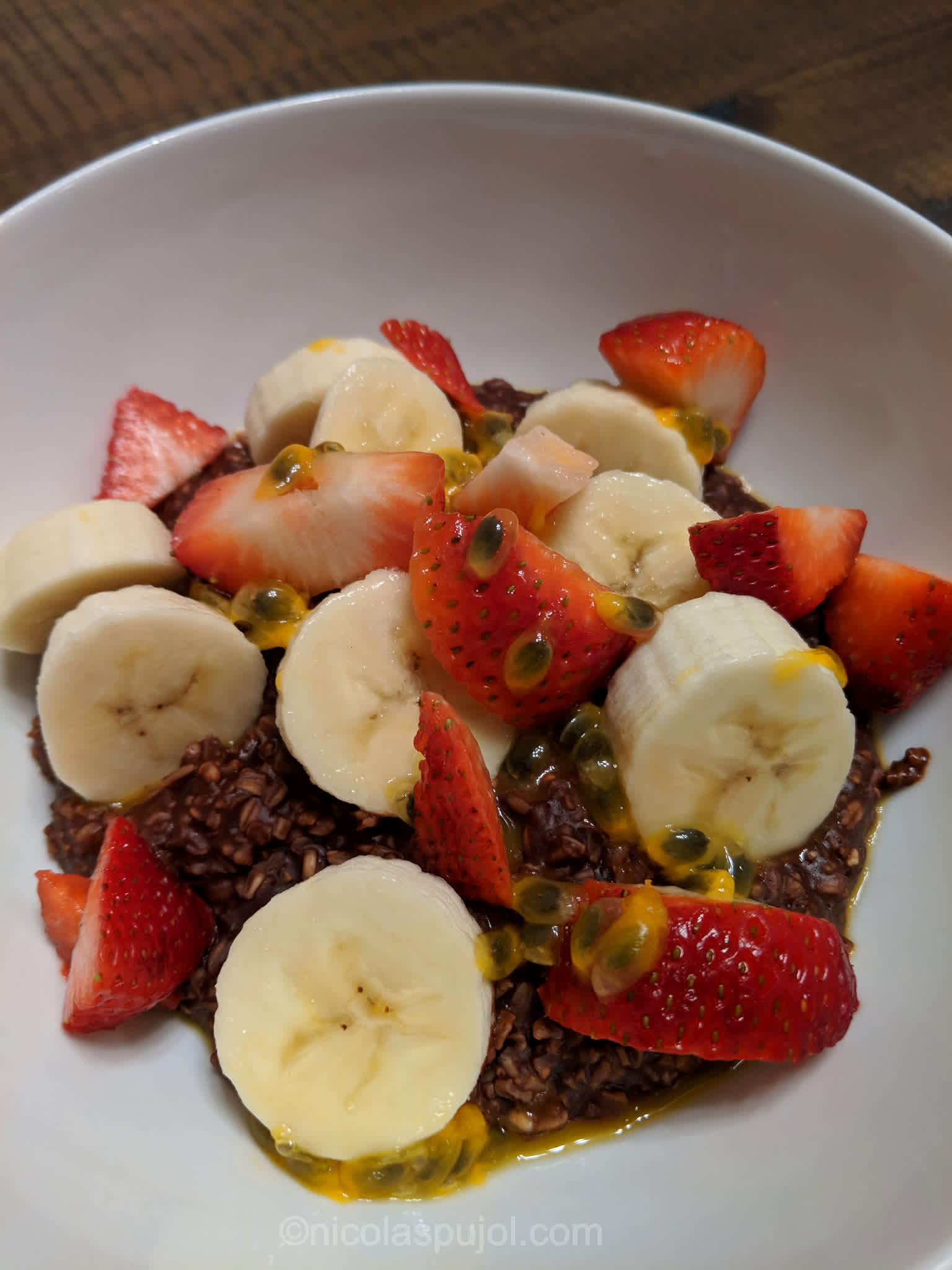 Chocolate oatmeal topped with fruits Oatmeal