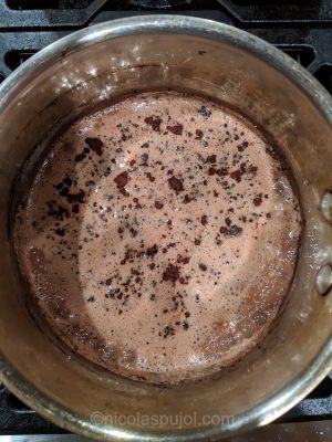 Cook oats in almond milk with cocoa powder