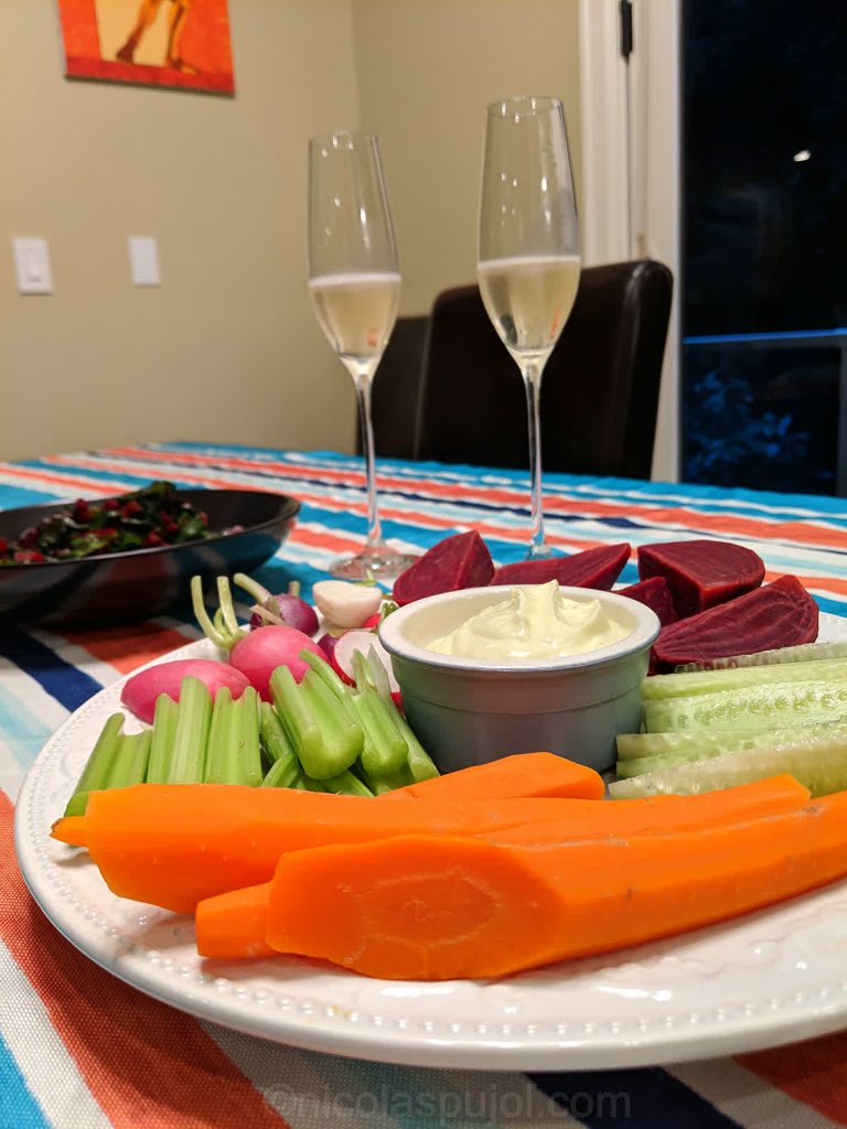 Decoration with sparkling wine and vegan aioli platter