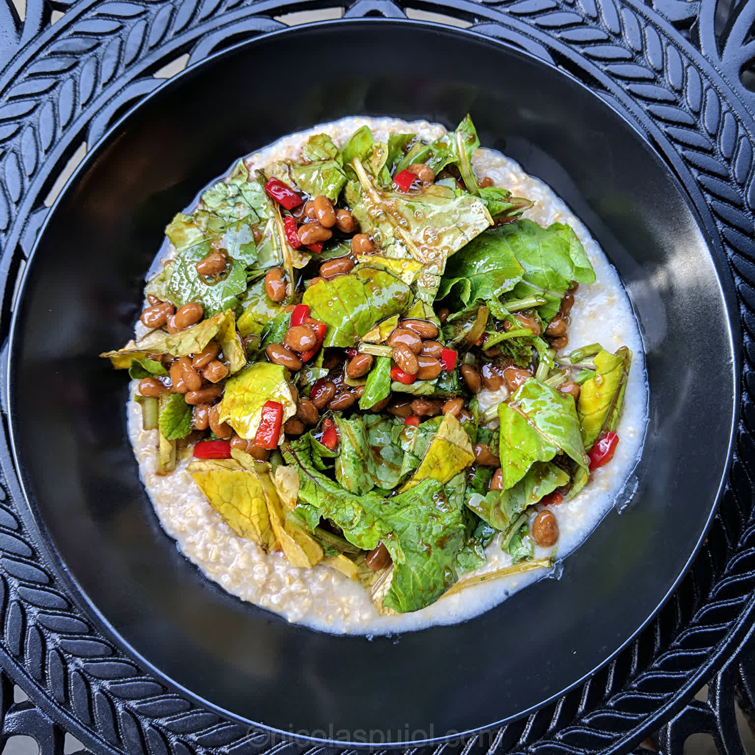 Natto and radish greens salad on a bed of oatmeal - Salads