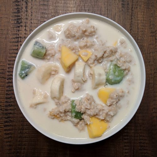 Oatmeal with kiwi mango banana and almond milk