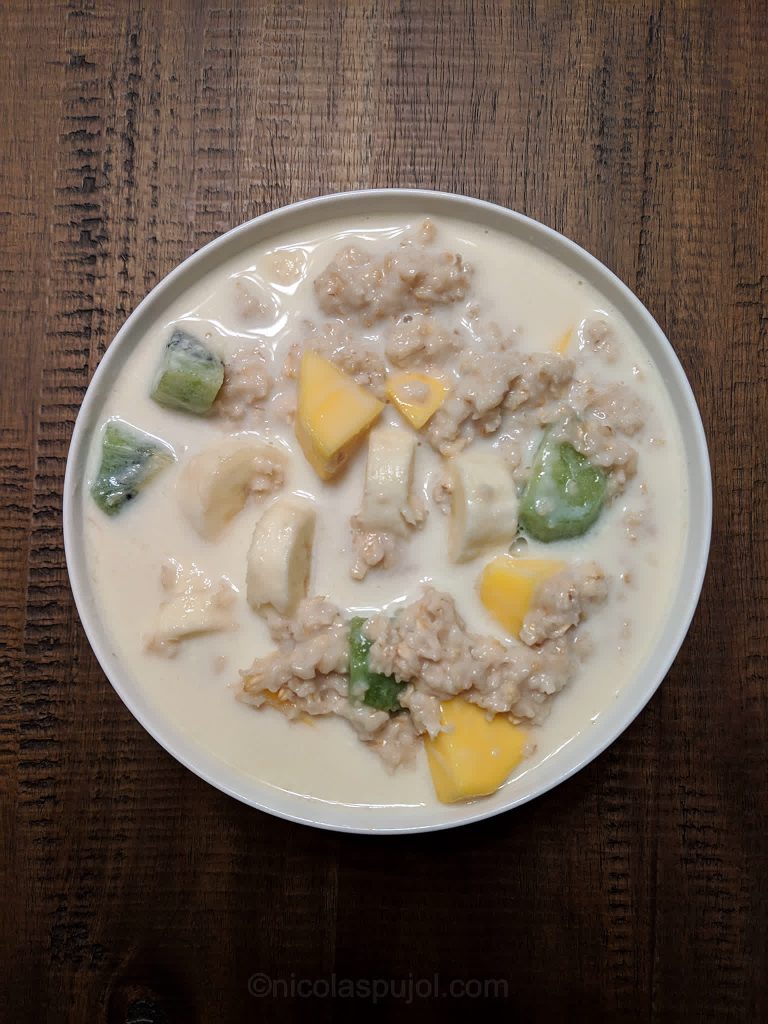 Oatmeal with kiwi mango banana and almond milk