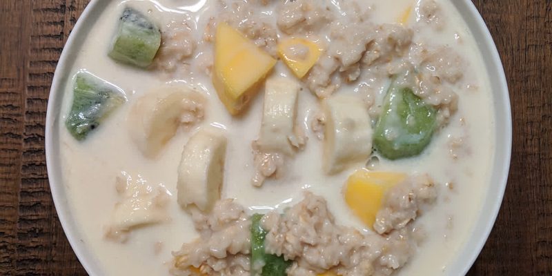 Oatmeal with kiwi mango banana and almond milk