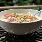 Orange banana oatmeal with soy milk and passion fruit