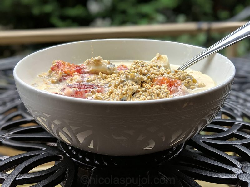 Orange banana oatmeal with soy milk and passion fruit