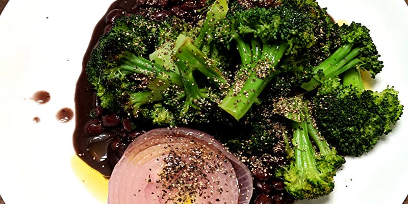 seared broccoli and onion in black bean base