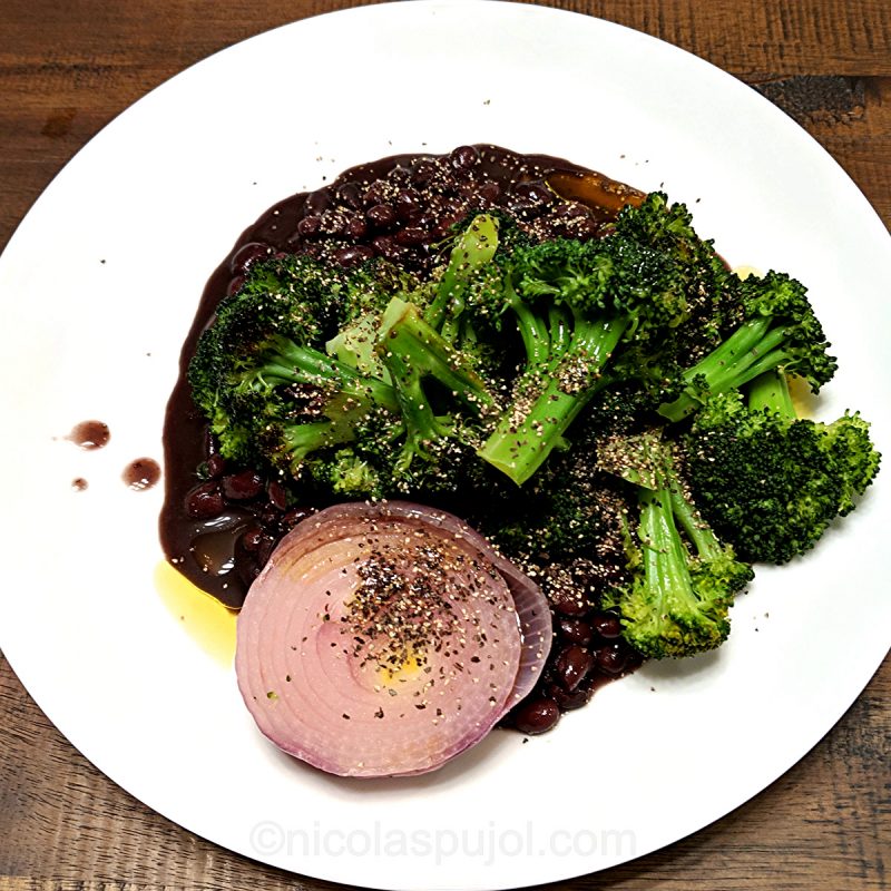 seared broccoli and onion in black bean base