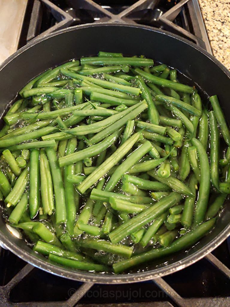 Boil green beans to make the salad