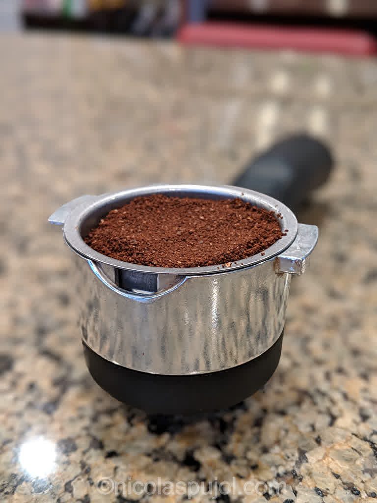 Fresh ground espresso coffee for vegan cappuccino