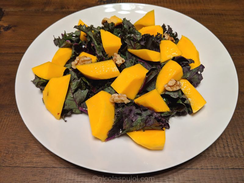 Almond mango kale and lemon juice salad without oil