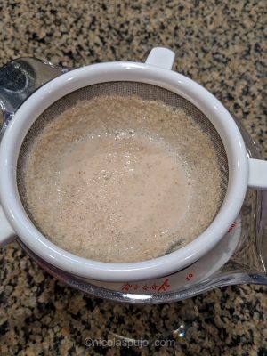 Filter and strain the oat milk through a strainer