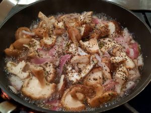 Mushrooms and red onions in white wine sautee
