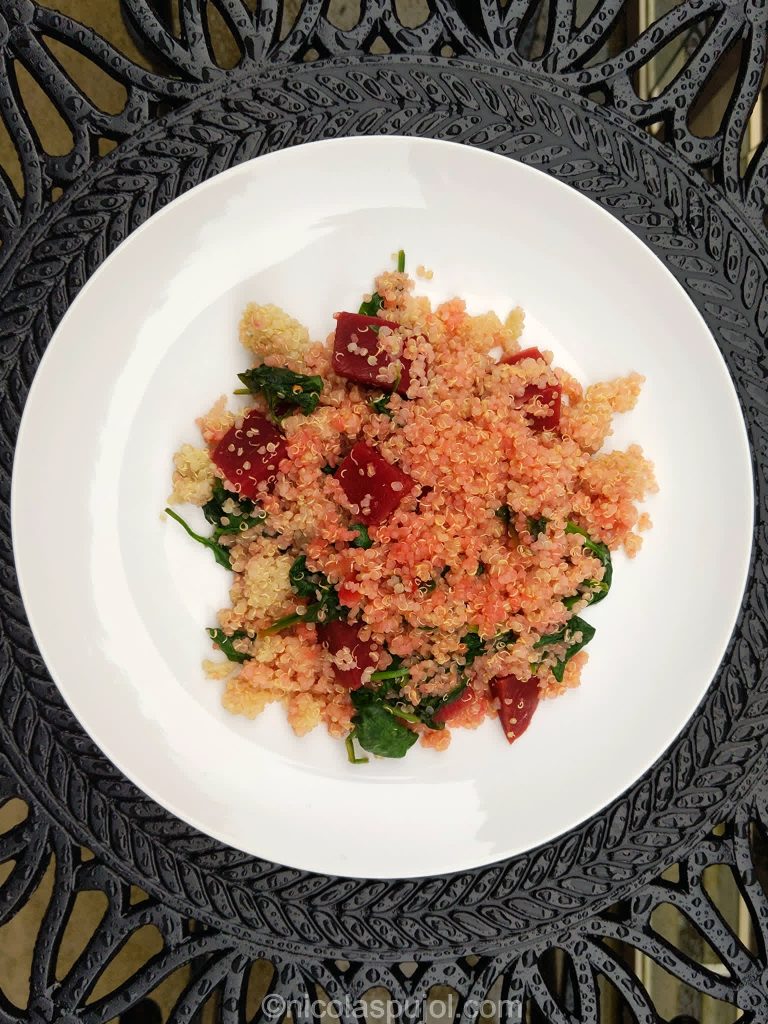 Oil-free quinoa salad with orange dressing, beets and spinach