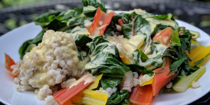 Rainbow chard over barley with oil-free lemon dressing