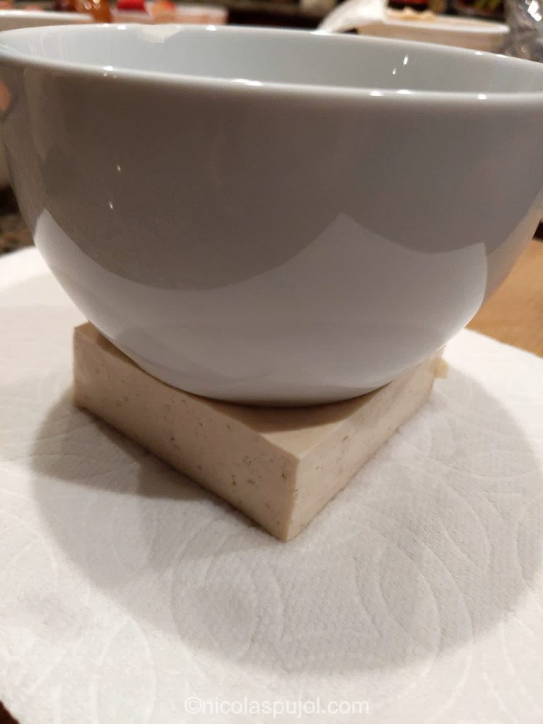 Removing excess water from tofu