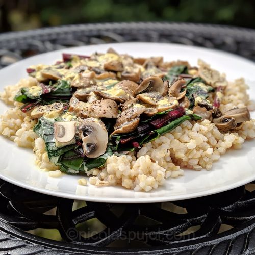 Rice with mushrooms, beet greens and lemon sauce