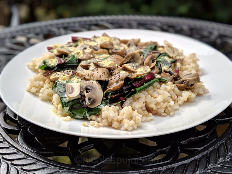 Rice with mushrooms, beet greens and lemon sauce