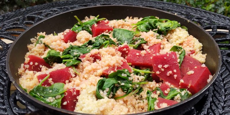 Spinach and beets in quinoa and orange dressing