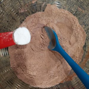Stir in the baking soda for vegan chocolate cake