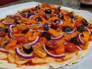 Vegan eggplant bell pepper BBQ pizza ready to bake