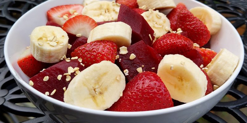 Breakfast for athletes with beets bananas and strawberries