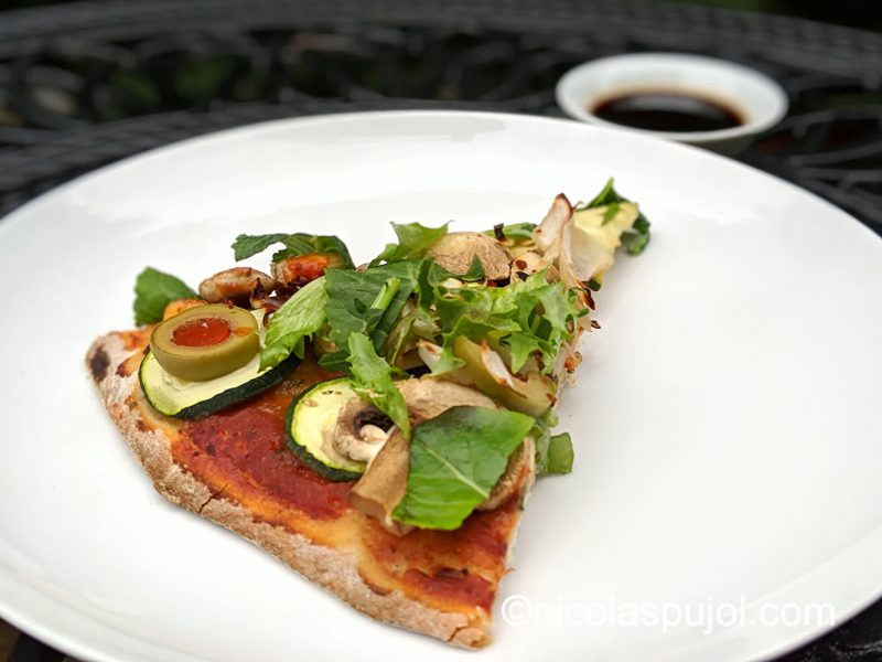 Vegan pizza with balsamic vinegar dressing