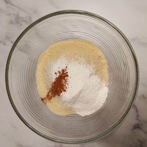 Mix almond flour with arrowroot starch and cinnamon